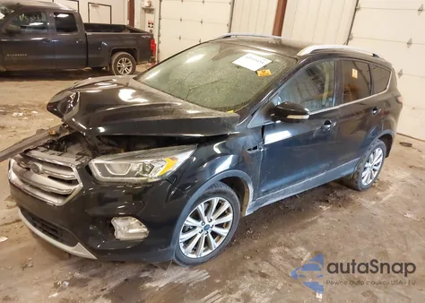 2017 Ford Escape Titanium z USA, uszkodzony, nr VIN 1FMCU9J94HUB99475